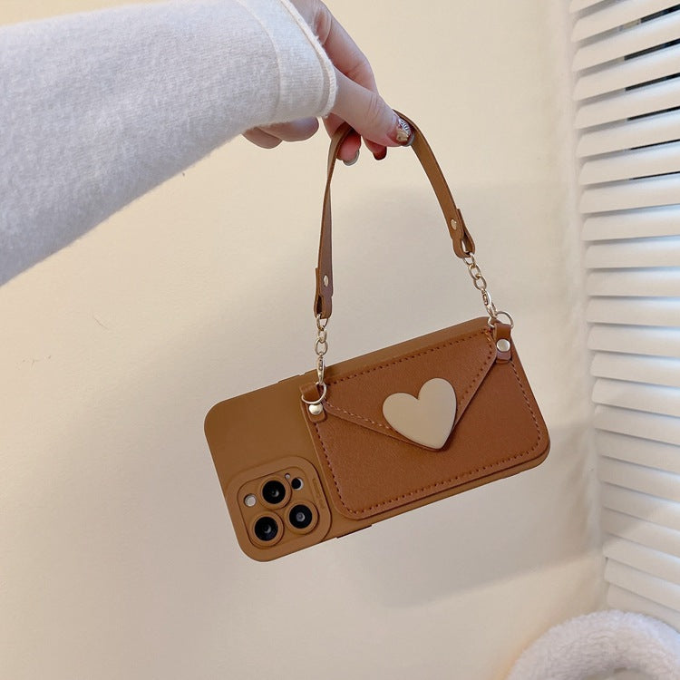 Front view of brown iPhone 15 case with strap