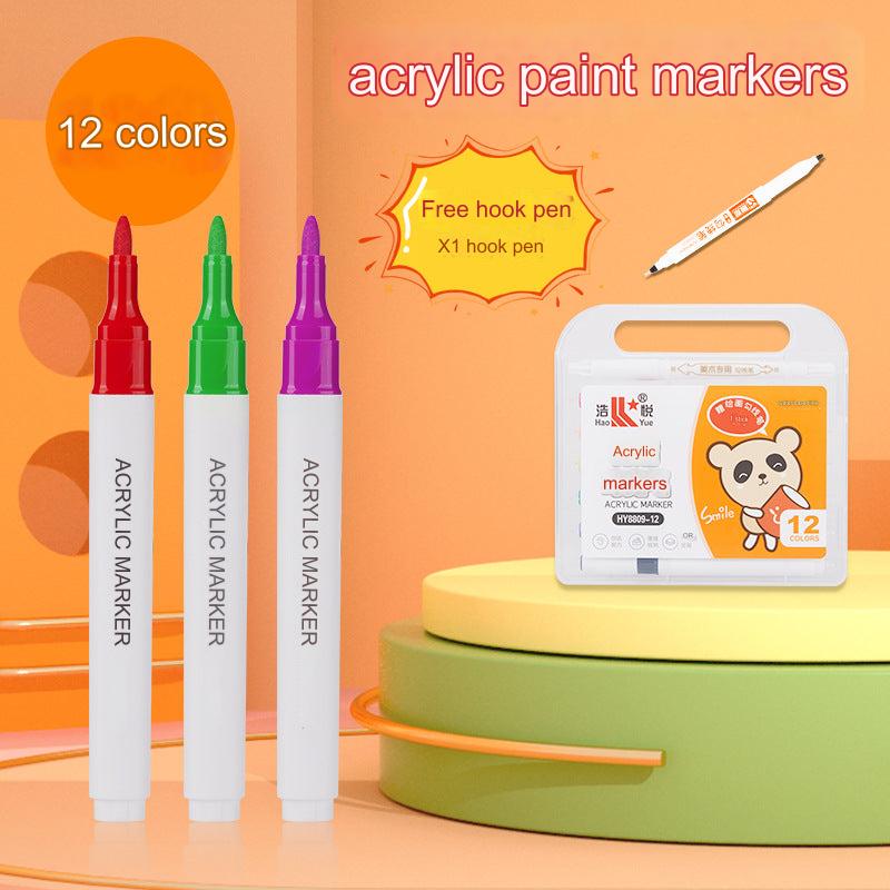 Markers in use on canvas and paper