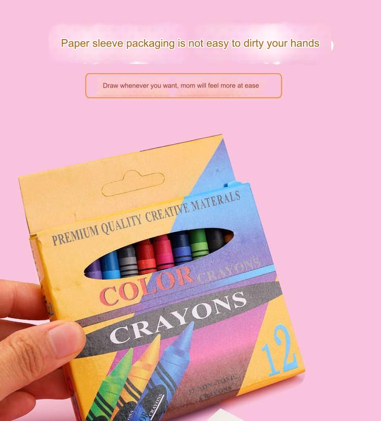 Child using crayons on a drawing pad