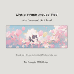 Large mouse pad with vibrant cats