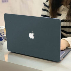 showcase of MacBook protective cases with ports open