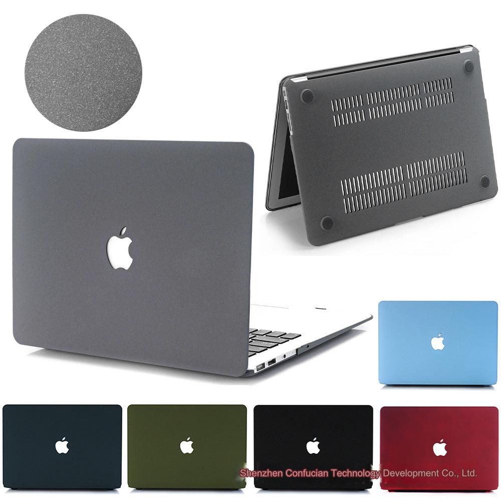 Gray MacBook case with sandstorm texture design