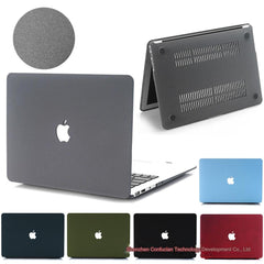 Gray MacBook case with sandstorm texture design