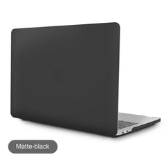 Creative professional with MacBook cover