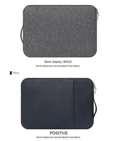purple laptop sleeve on table