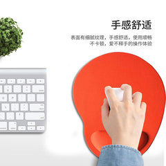 Gray non-slip wrist cushion on desk
