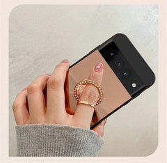 Gold and silver phone cases displayed together