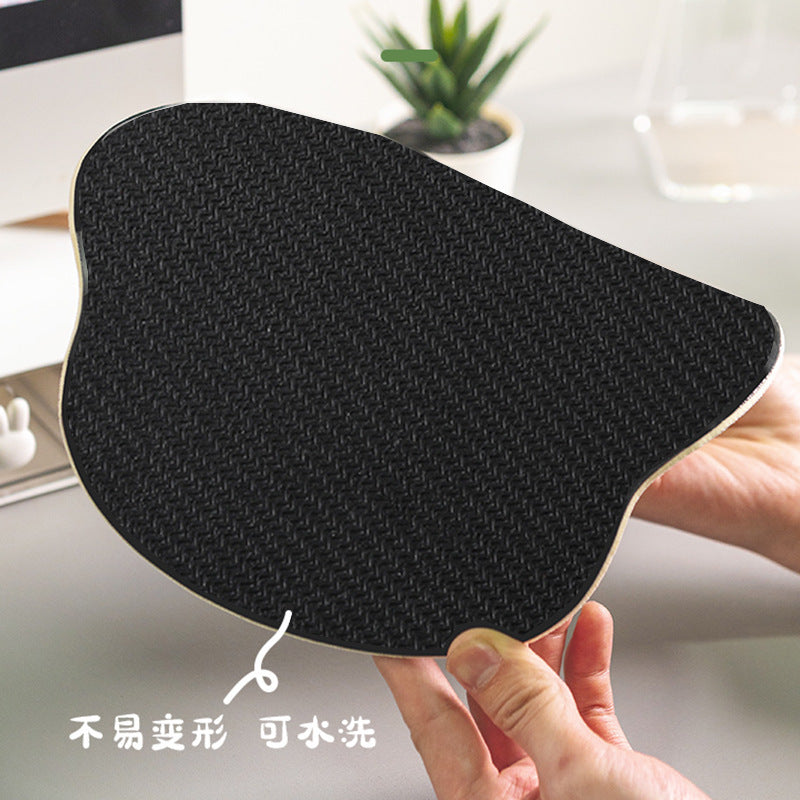 Mouse pad with ergonomic support for gaming