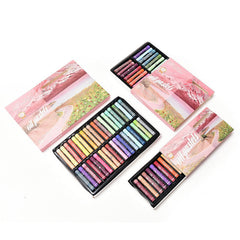 Flat lay of oil pastels with colourful creations