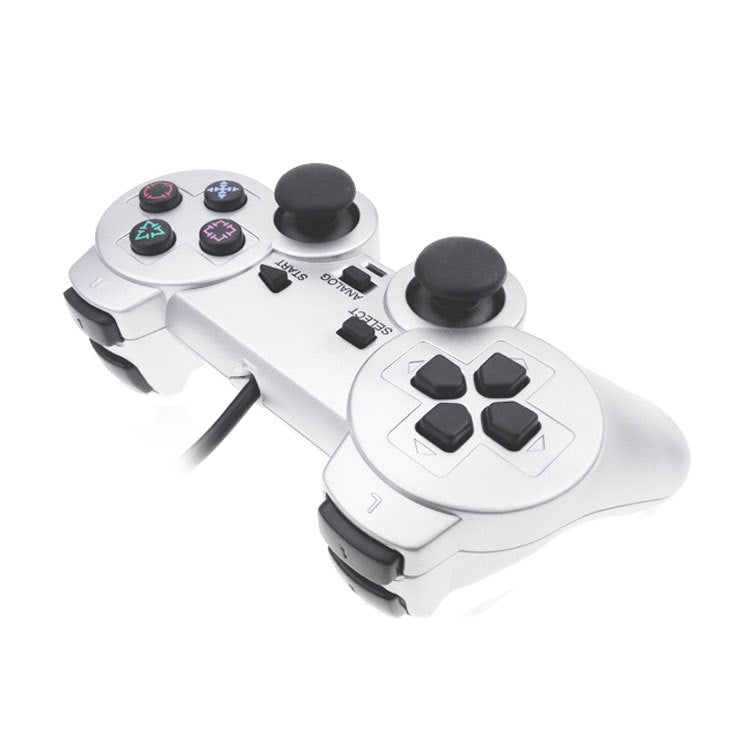 Wired PS2 Game Controller placed on gaming console