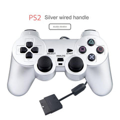 Wired PS2 Game Controller in hands during gameplay