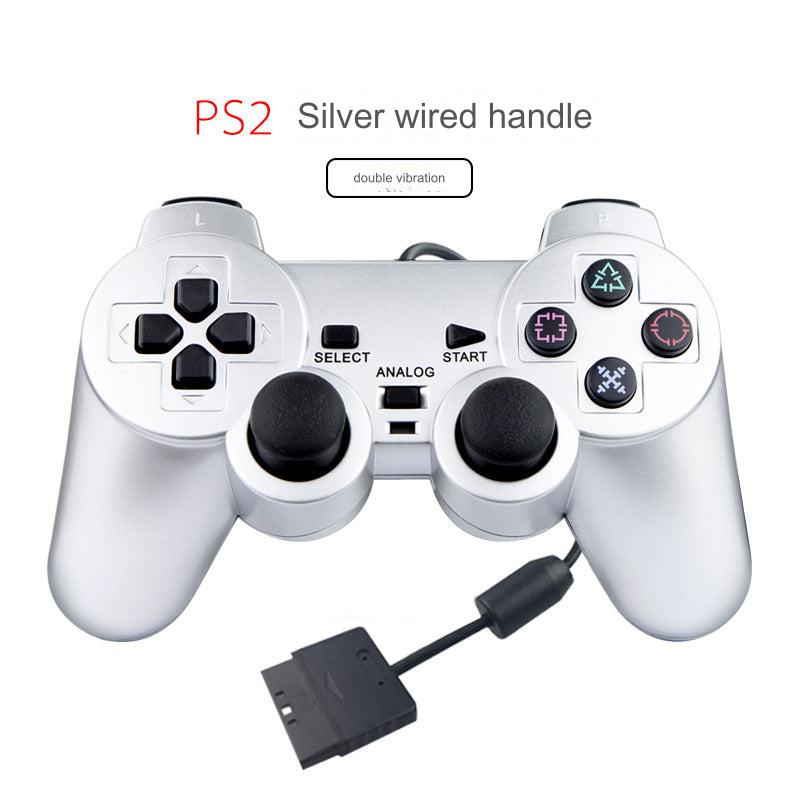 Wired PS2 Game Controller in hands during gameplay