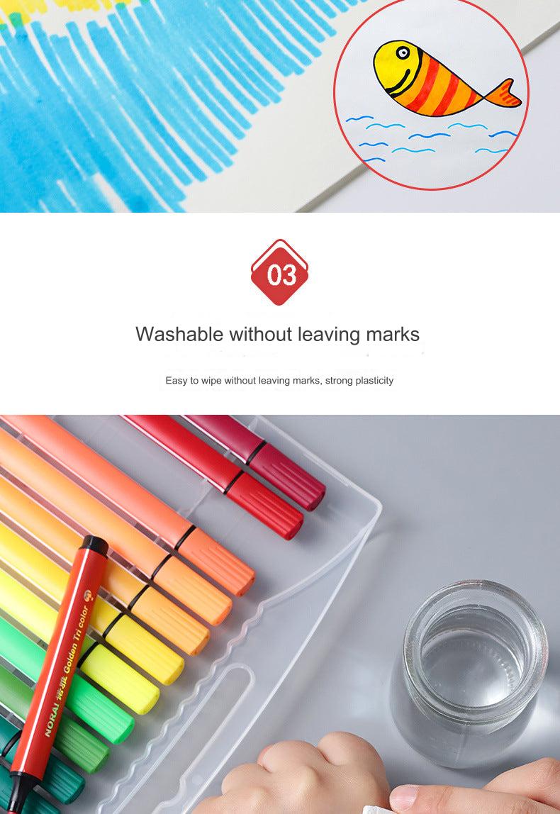 happy child using washable markers for drawing
