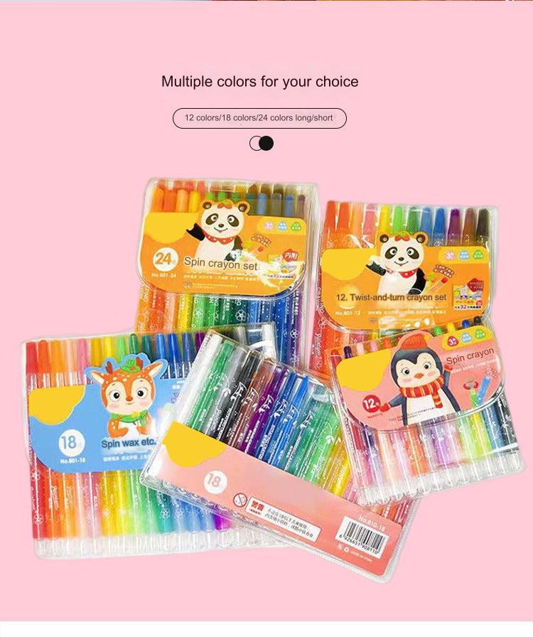 Children using colourful crayons for drawing