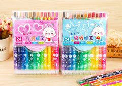 Children using colourful crayons for drawing