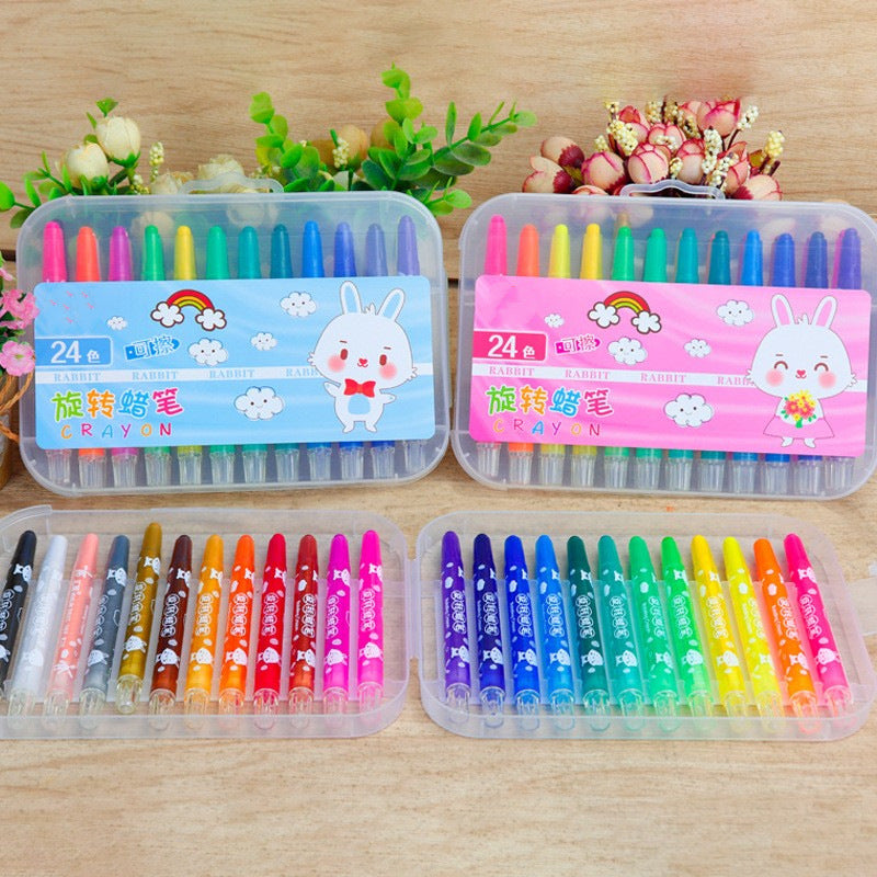 Happy child creating artwork with crayons