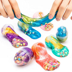 Galaxy Egg Slime being stretched in hands
