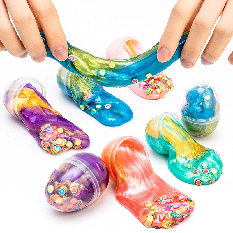 Galaxy Egg Slime being stretched in hands