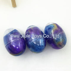 Galaxy themed slime eggs in a colourful box