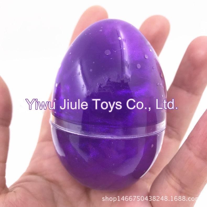 Galaxy themed slime eggs in a colourful box
