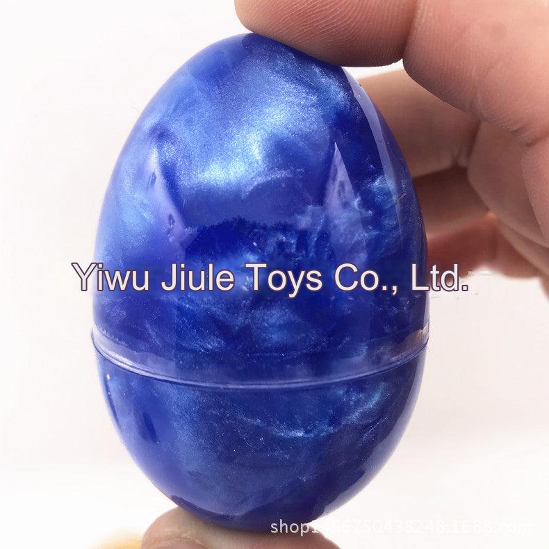 Galaxy Egg Slime being stretched in hands