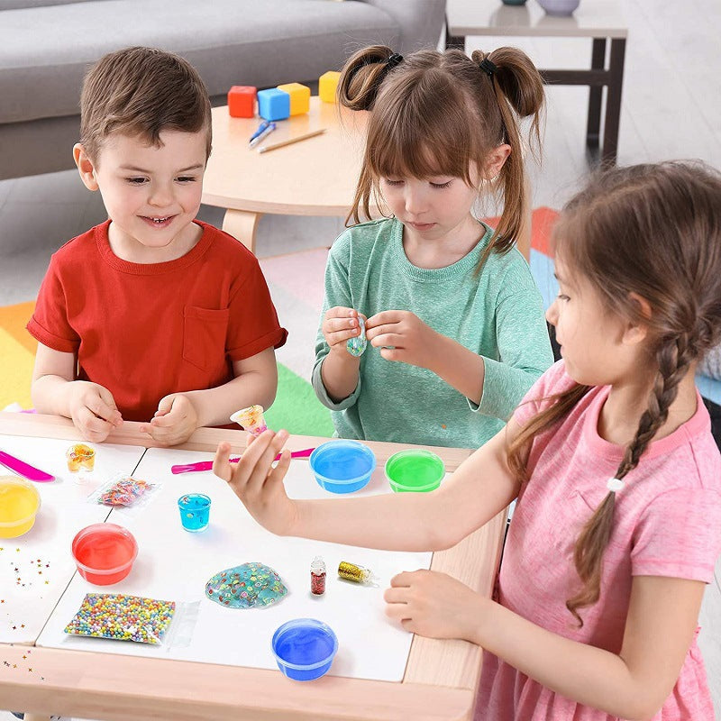 Colourful slime cups and tools in the kit