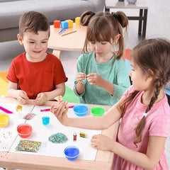 Colourful slime cups and tools in the kit