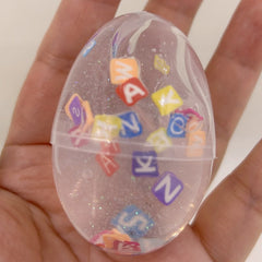 egg-shaped slime pieces in assorted colours