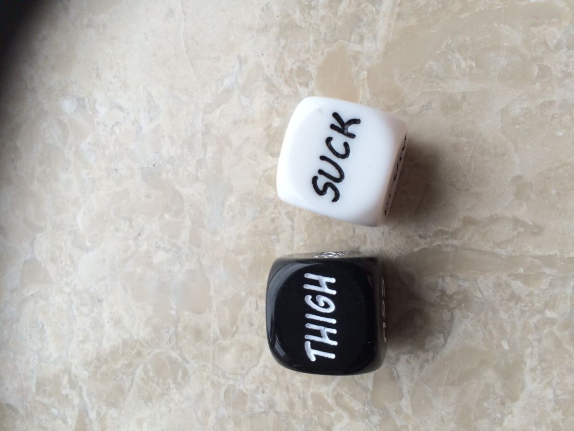Couples Playing with Glow-in-the-Dark Dice - Image 2