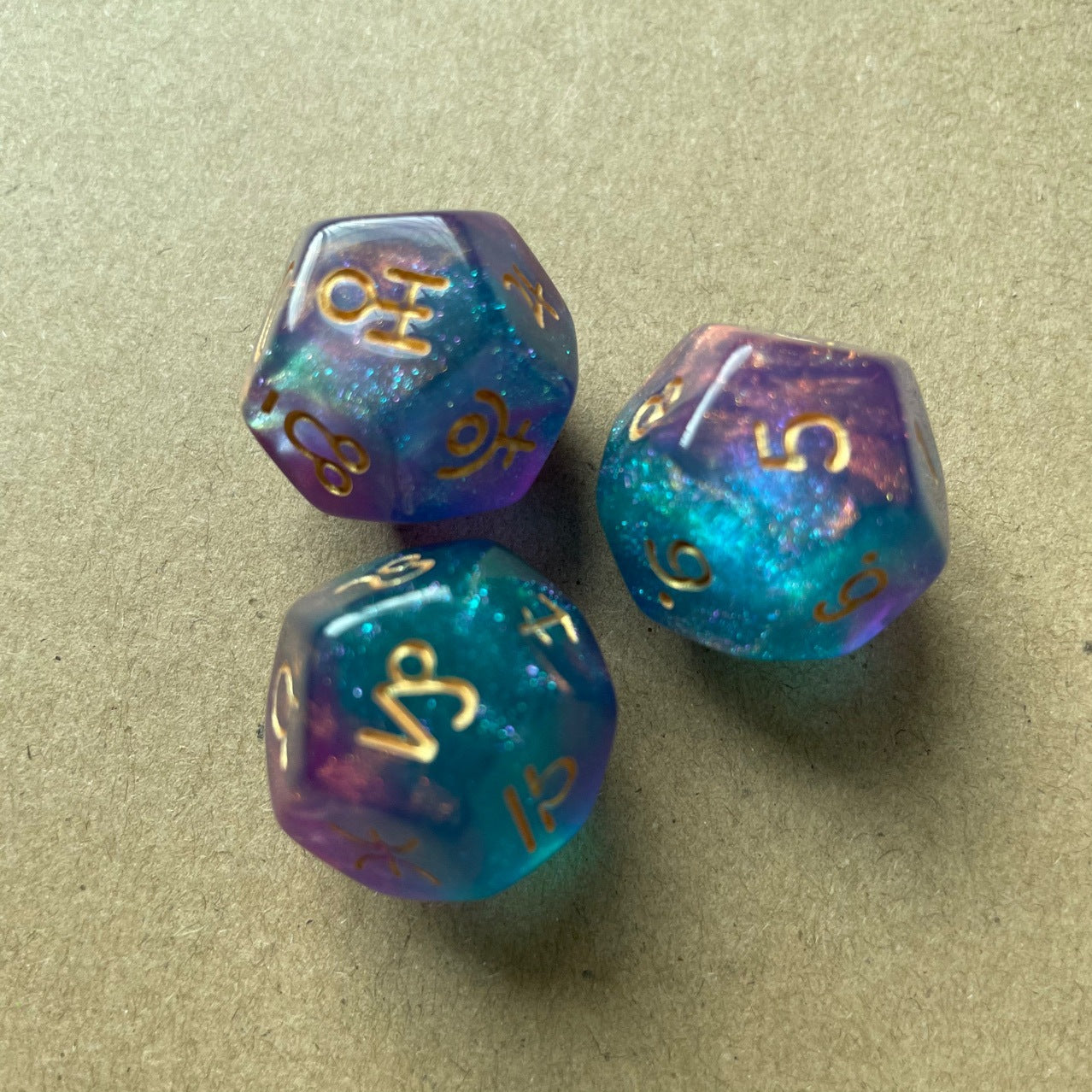 variety of 12-sided zodiac dice