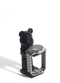 Desk with astronaut resin stand and office items