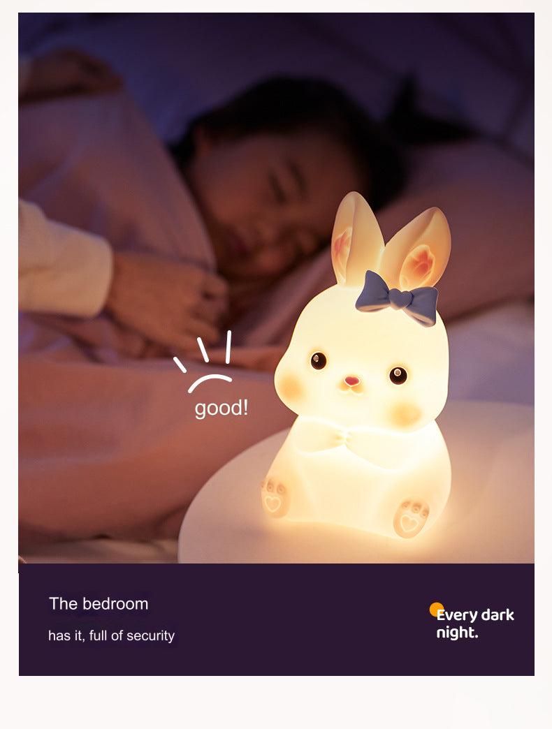Bunny lamp on bedside table in nursery