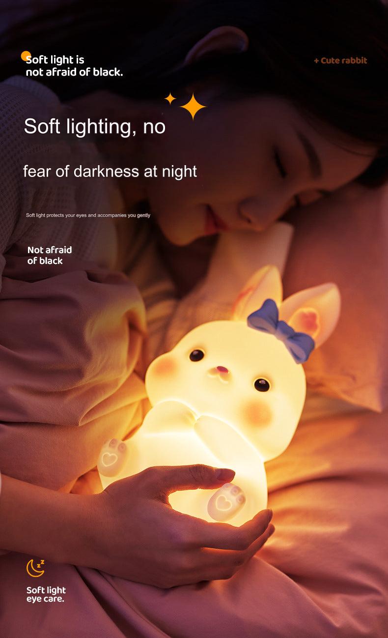 Bunny lamp on bedside table in nursery