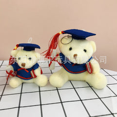 Soft toy graduation bear with a happy expression