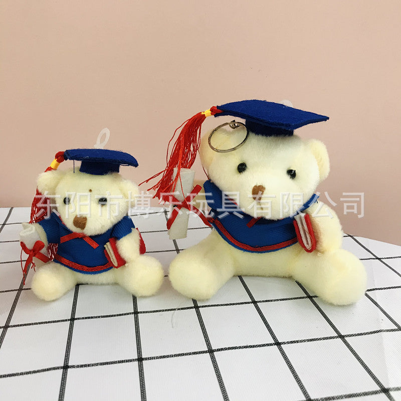 Soft toy graduation bear with a happy expression