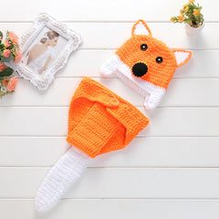 Vibrant orange baby knitwear displayed image 6