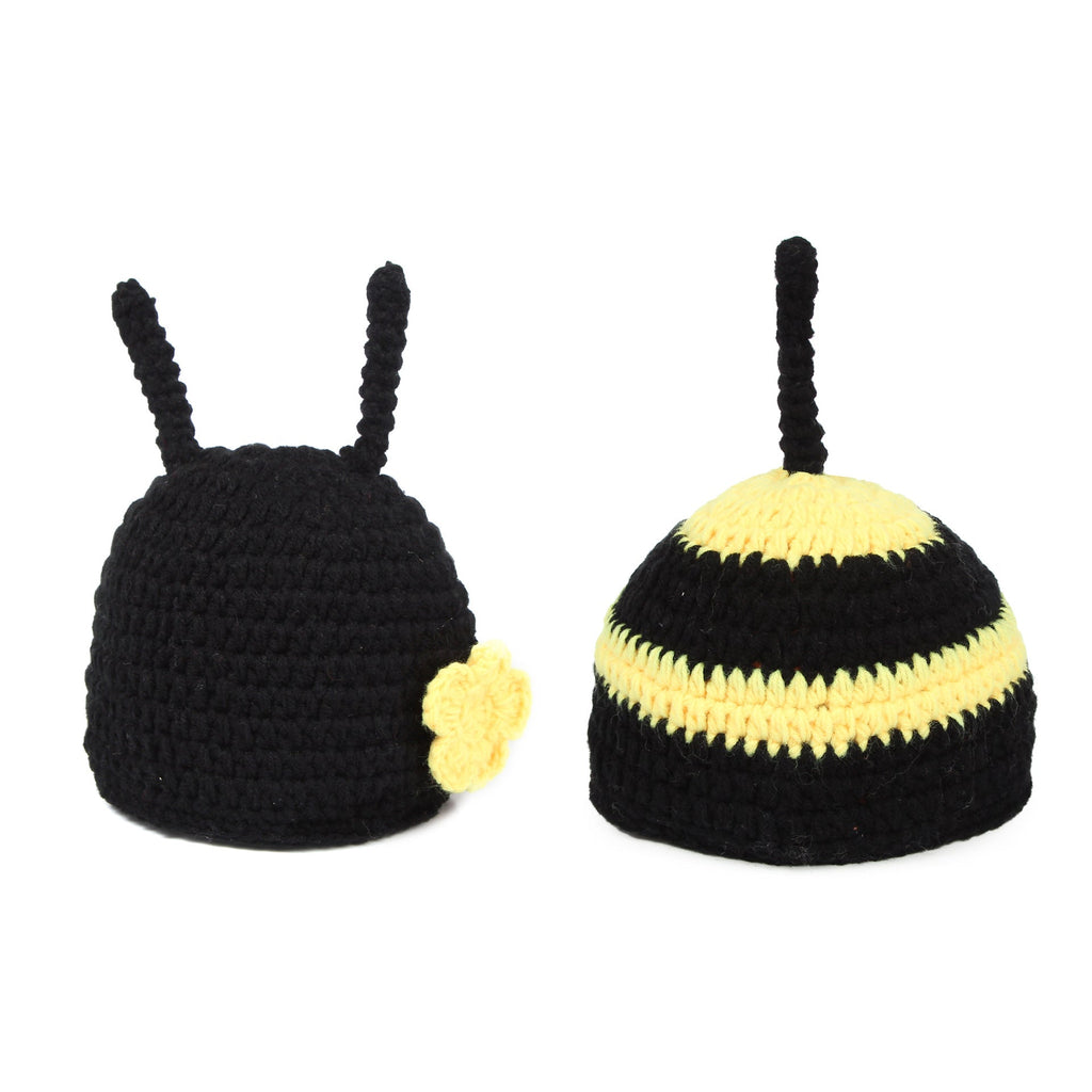 Artisan-crafted bee-shaped photo prop in use
