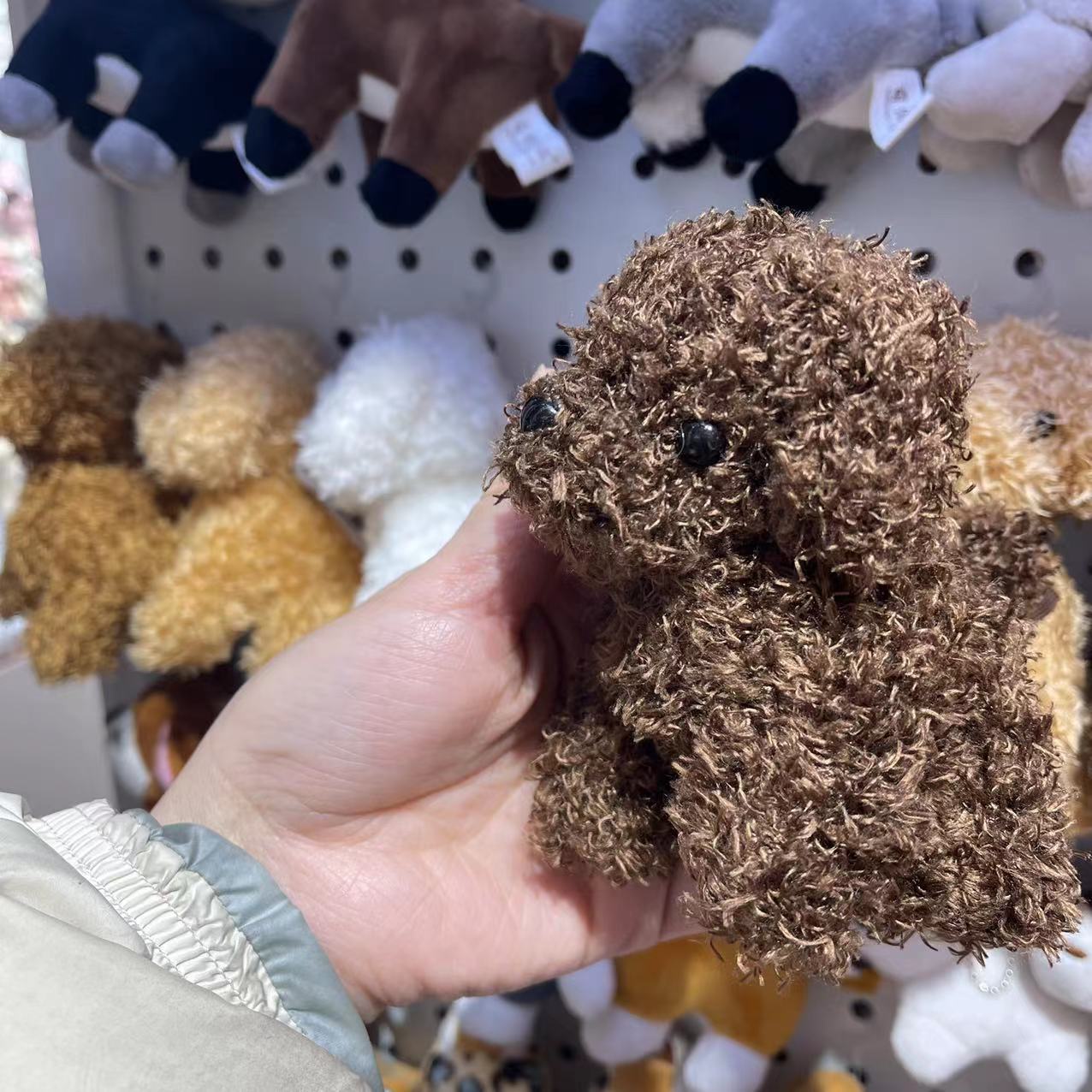 Hanging Plush Dog Keychain in Car