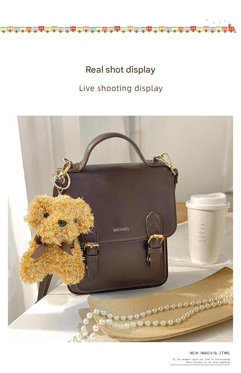 Cute Dog Plush Keychain Against Background