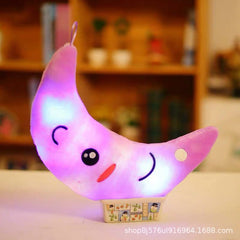 Colourful star-shaped LED plush pillow