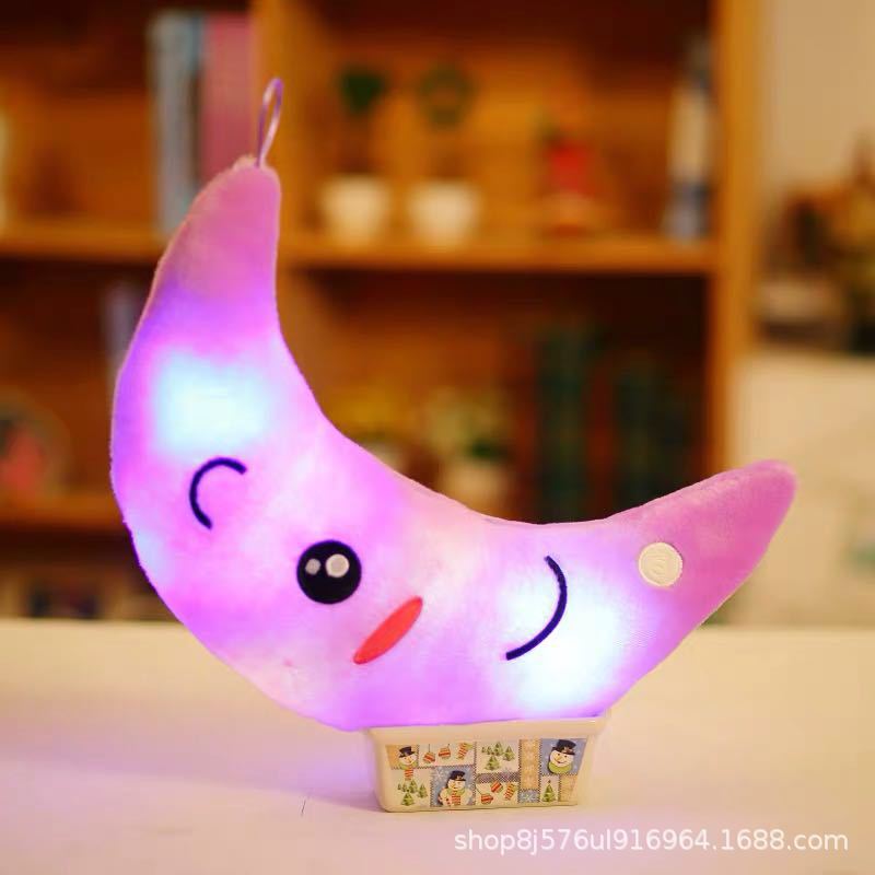 Colourful star-shaped LED plush pillow