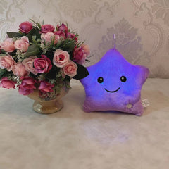 Girls playing with star plush pillow