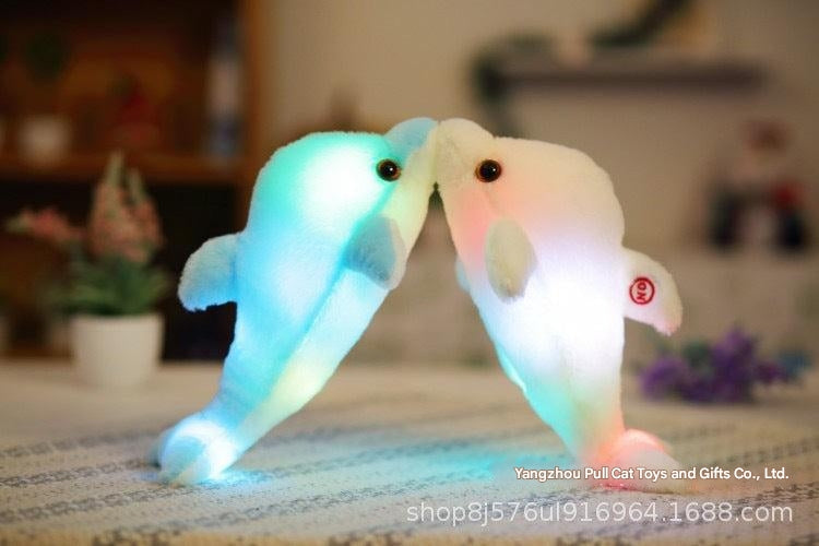 Soft fabric detail of glowing dolphin toy