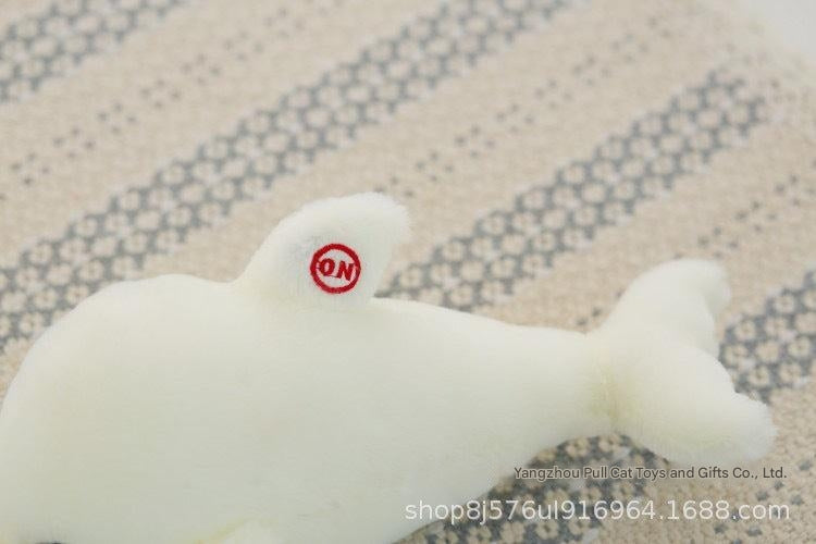 Cuddly glowing dolphin plush toy light feature
