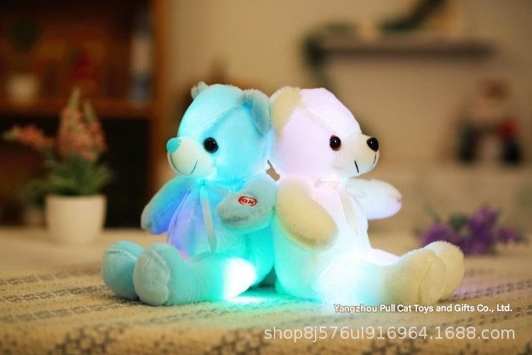 Different angles of the glowing dolphin toy