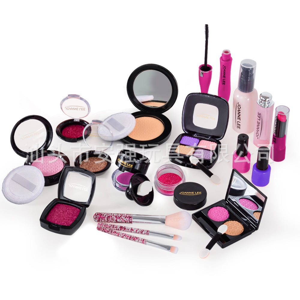 Girl playing with makeup set and mirror
