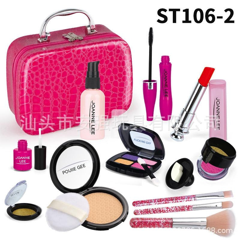 Close-up of lipstick and brushes in toy kit