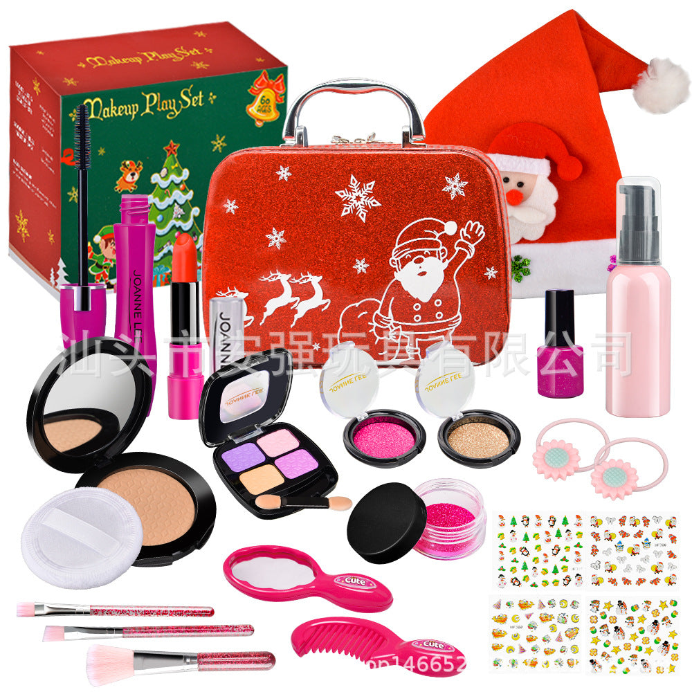 Close-up of lipstick and brushes in toy kit