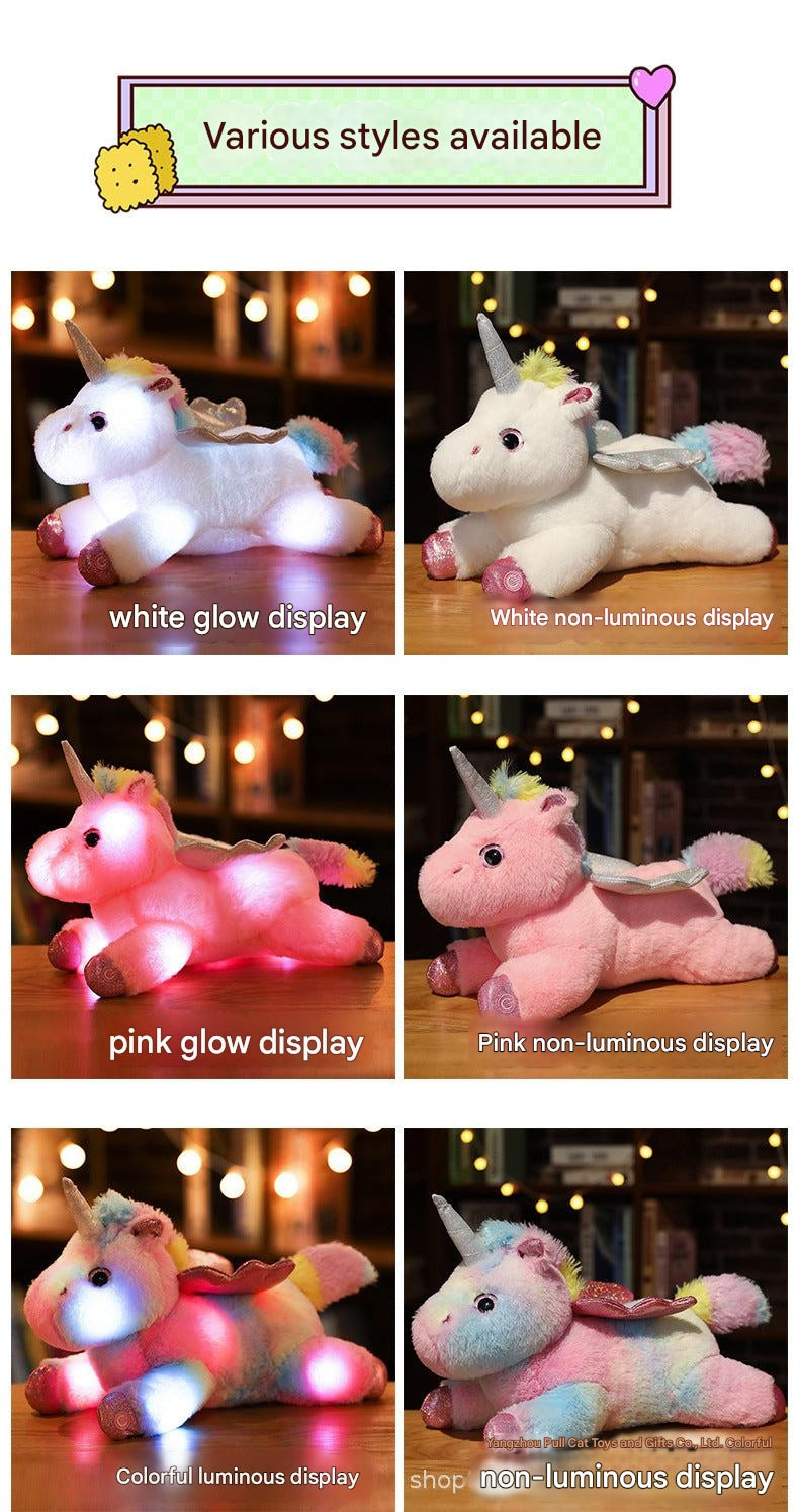Glowing Unicorn Plush Toy on bed