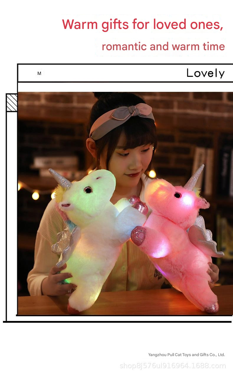 Glowing Unicorn Plush Toy with child